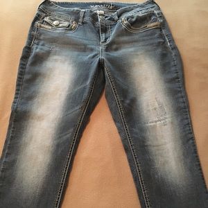 Maurices women’s distressed jeans.